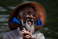 Old Man In A Boat - Hoi An, Viet Nam